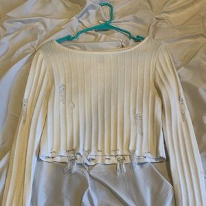 Distressed crop top sweater